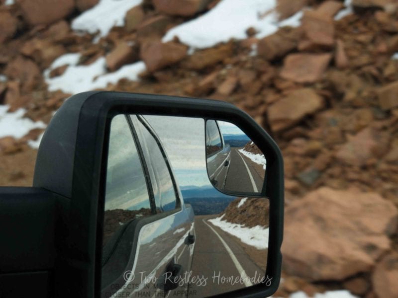 The climb up Pikes Peak in the Ford F150 rearview mirror, Colorado Springs, CO USA