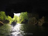 Cave tubing, floating into Footprint Cave entrance