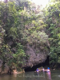 Cave tubing group tubing out of Footprint Cave, Belize