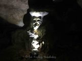 Mayan clay mask on altar in Footprint Cave
