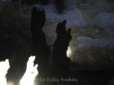 Mayan sculpture shadow in Footprint Cave