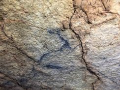 Signs of ancient fire on ceiling while cave tubing in Belize