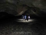 Walking through Footprint Cave in Belize