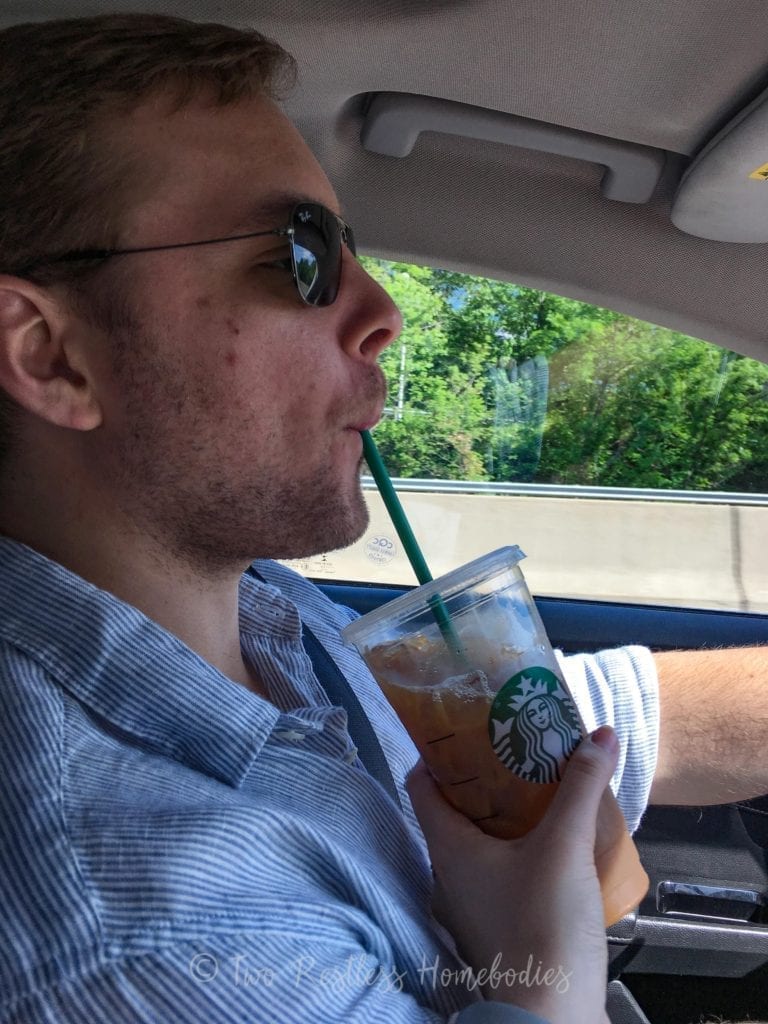 Luke-getting-a-starbucks-sip-on-a-road-trip-2