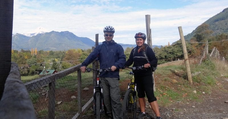 Peter and Lindsay biking in Pucon Chile - Where is your toothbrush