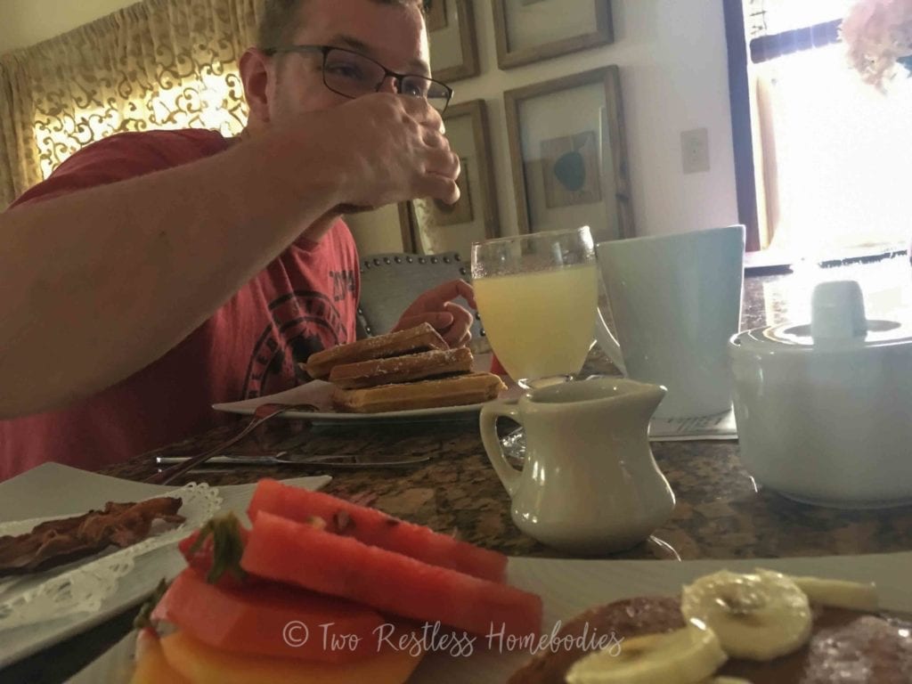 Luke eating a big breakfast at Chabil Mar, Placencia, Belize
